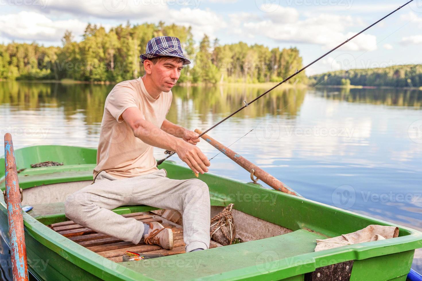 Fisherman in a boat photo