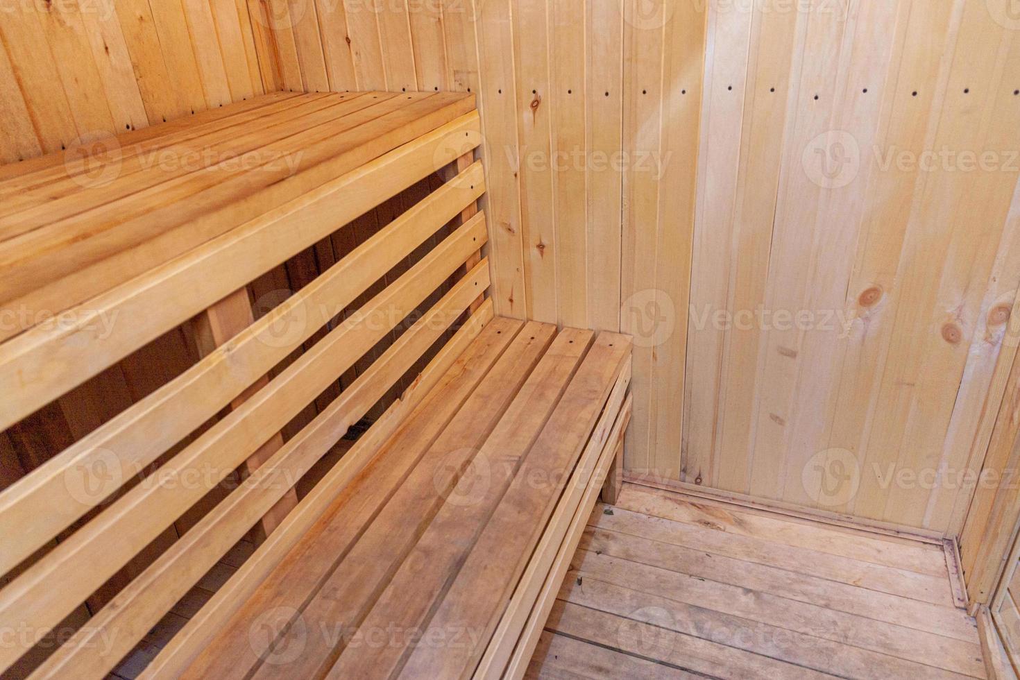 Interior details of traditional Finnish sauna steam room. Traditional old Russian bathhouse SPA Concept. Relax country village bath concept. photo