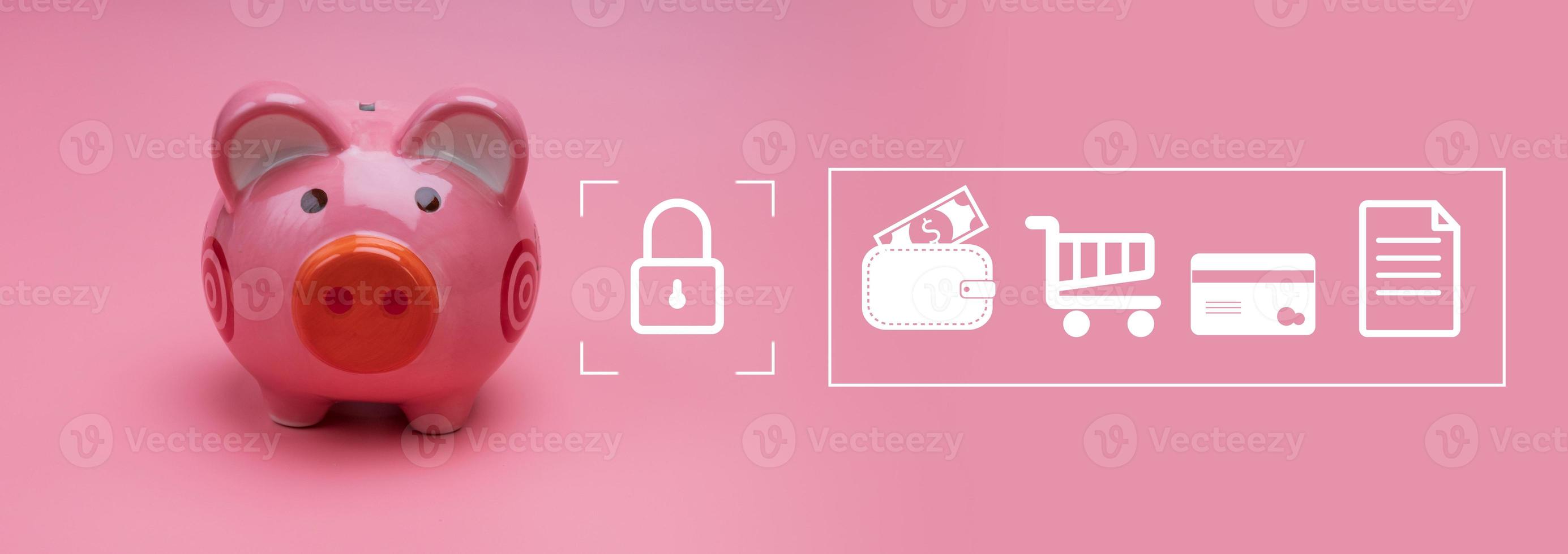 pink piggy bank on pink background, Financial discipline comes from a willingness to save and a thoughtful approach to spending. photo