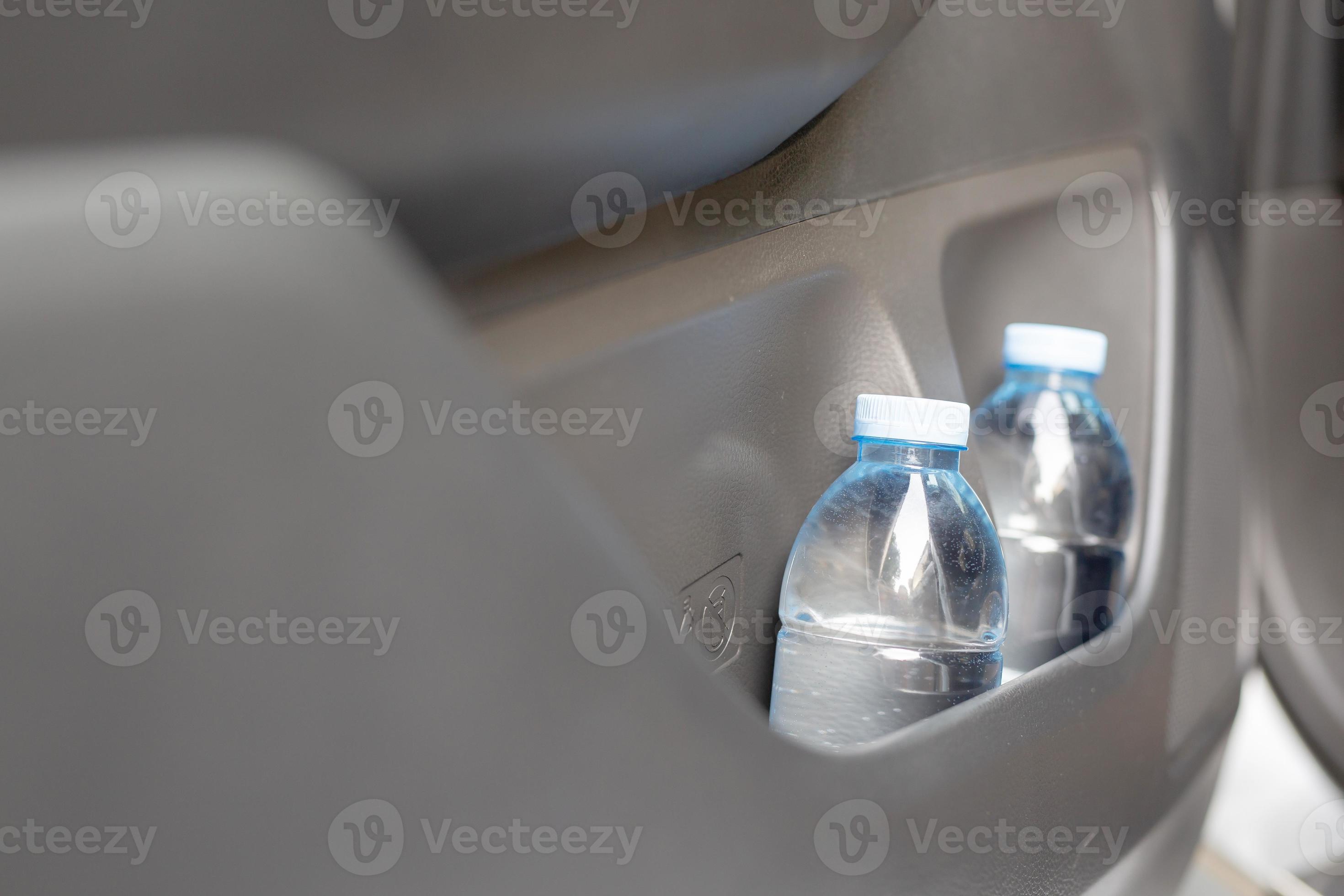 Drinking water in the car prepared for traveling 13092263 Stock Photo at Vecteezy