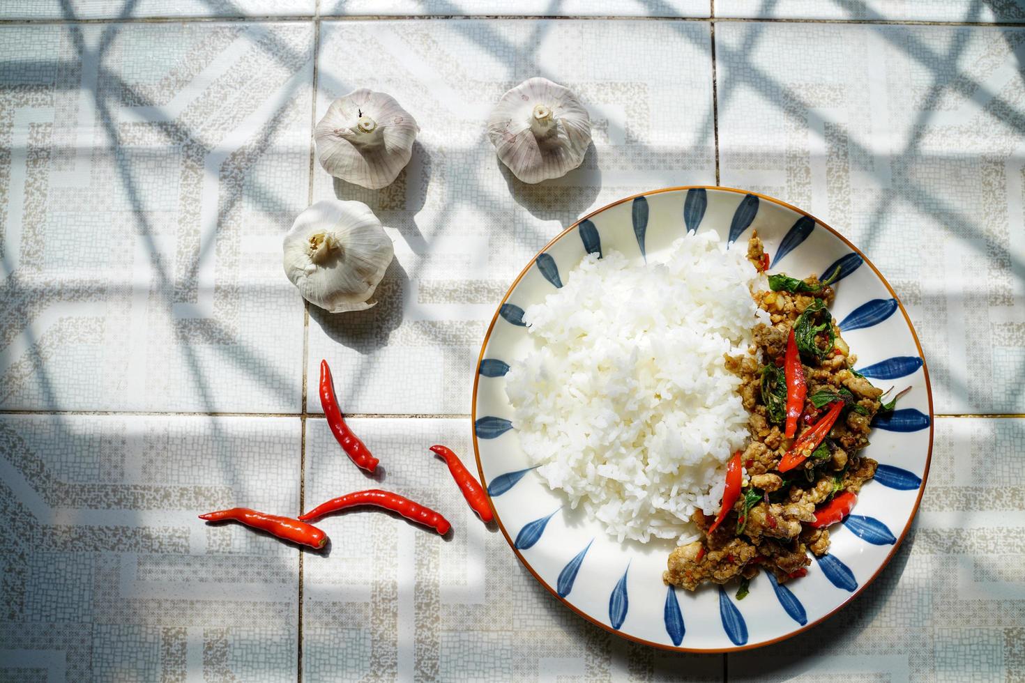 Stir-fried basil with minced pork is a popular dish because it's quick and easy to make.  spicy taste photo