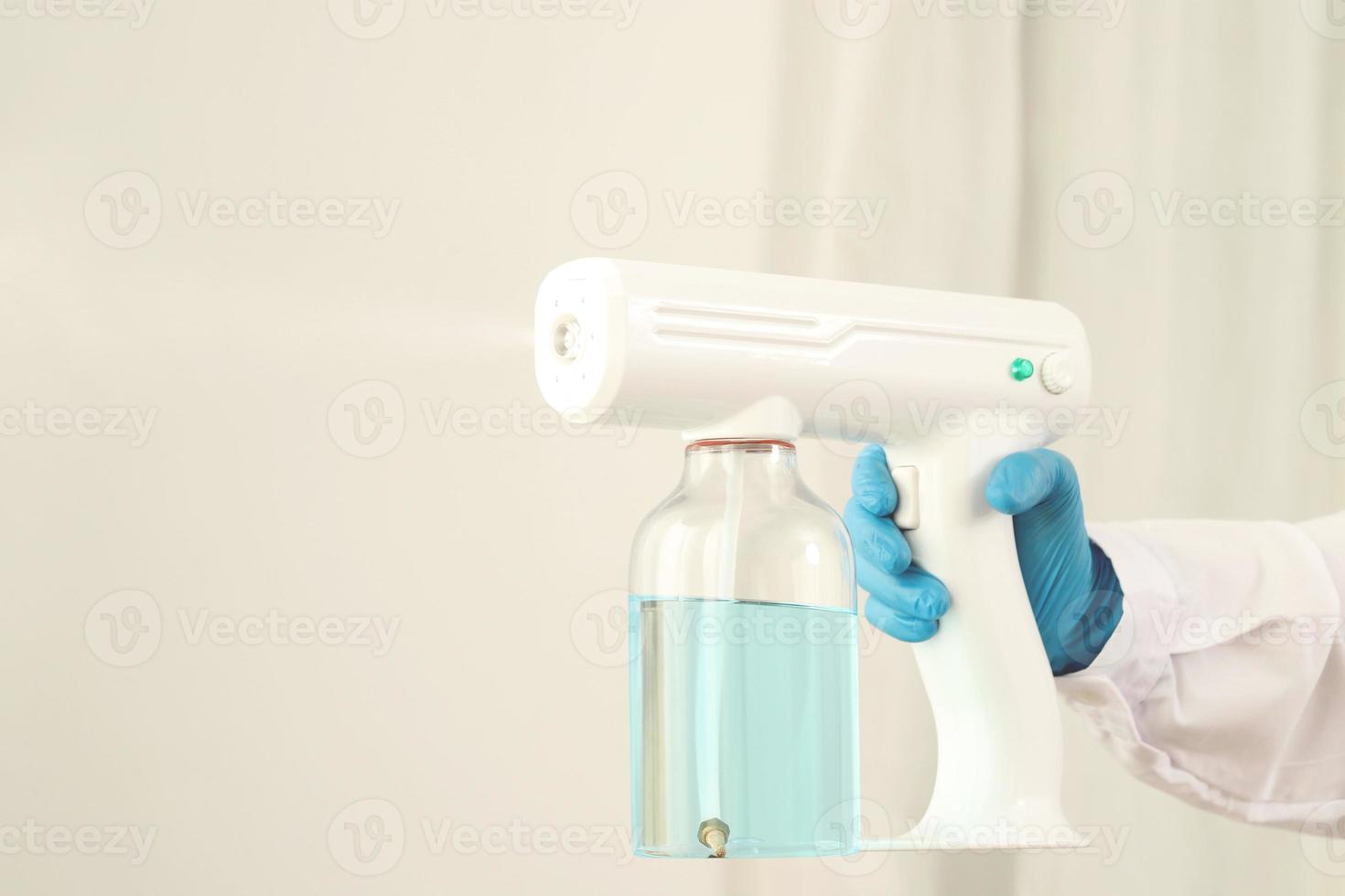 Nano sterilizer gun is used to kill covid 19 virus. photo