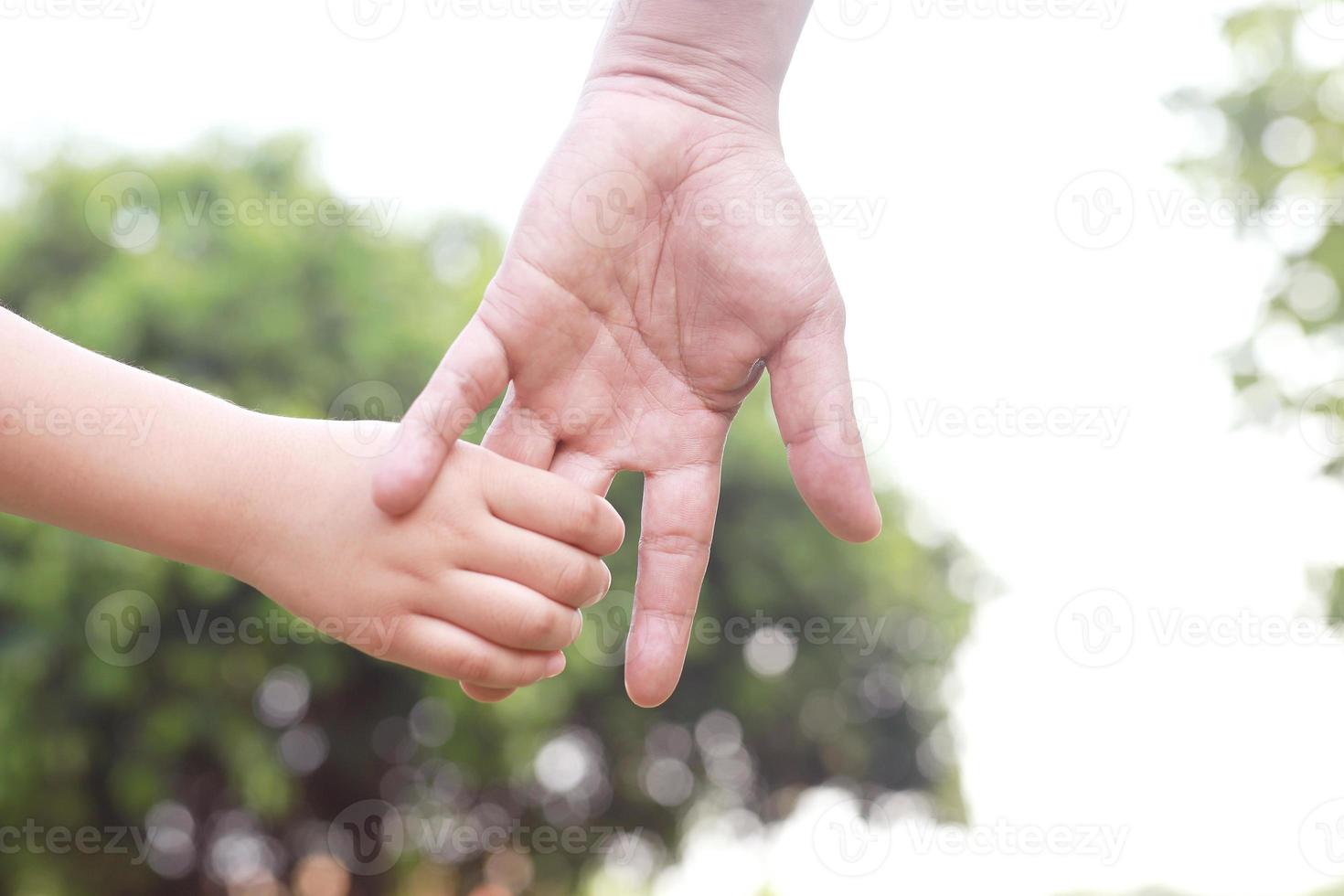 Children's hands with care, concern, warmth of mothers. photo