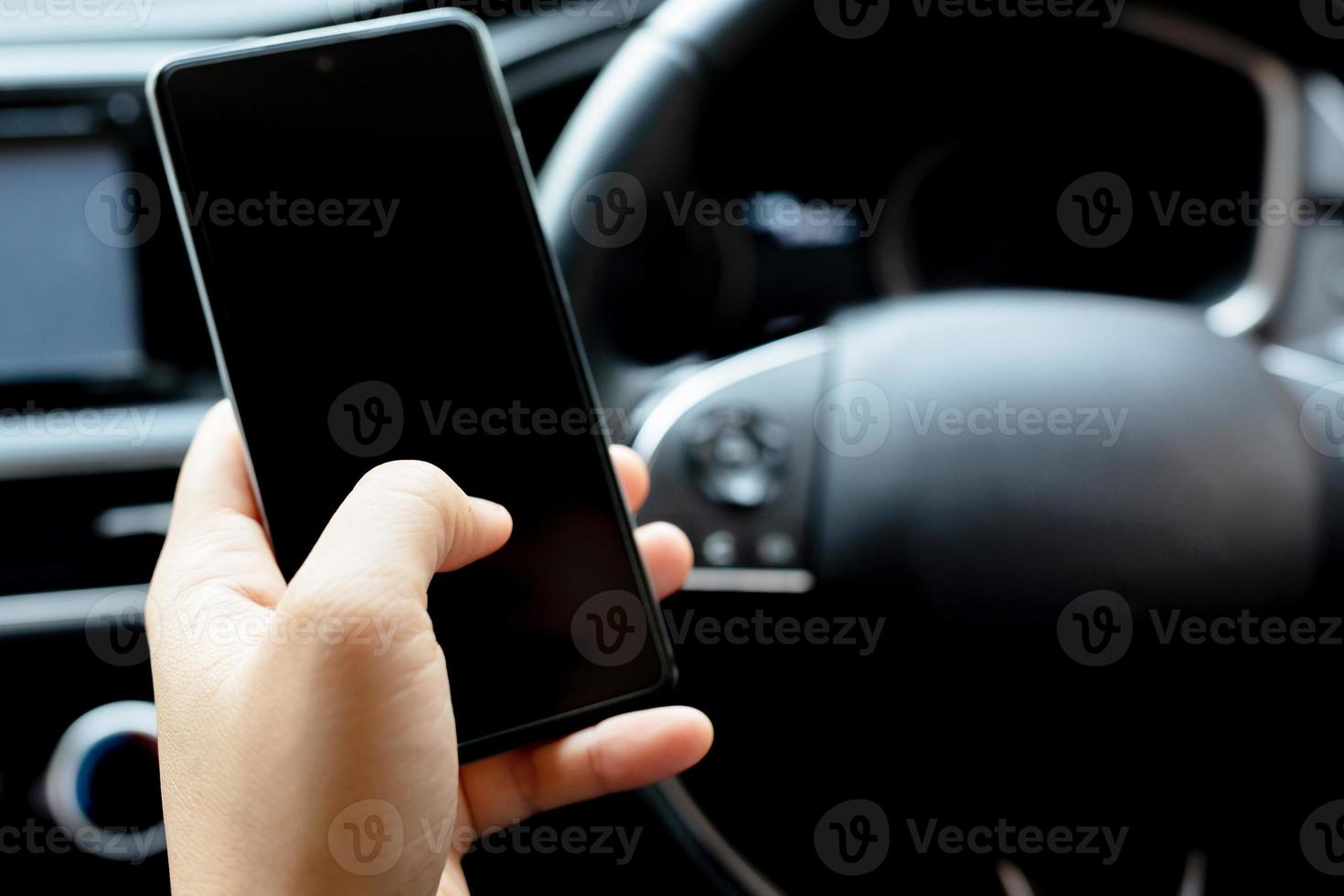 She was driving and playing on the phone while going to work. photo