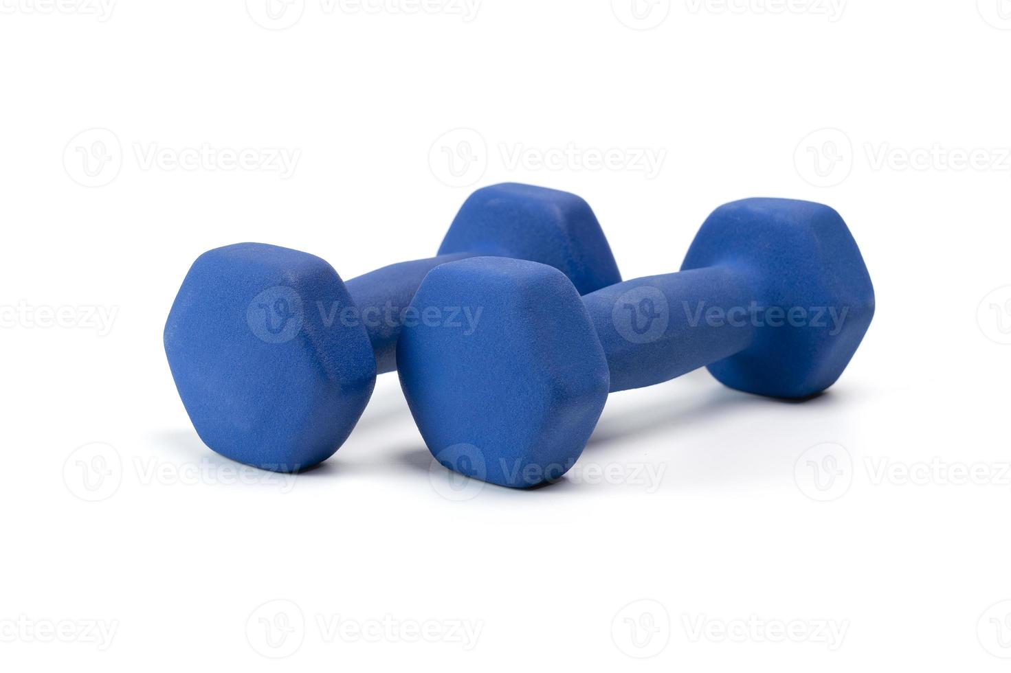 Pesas de pesas azules para ejercicio o fitness aislado sobre fondo blanco. foto