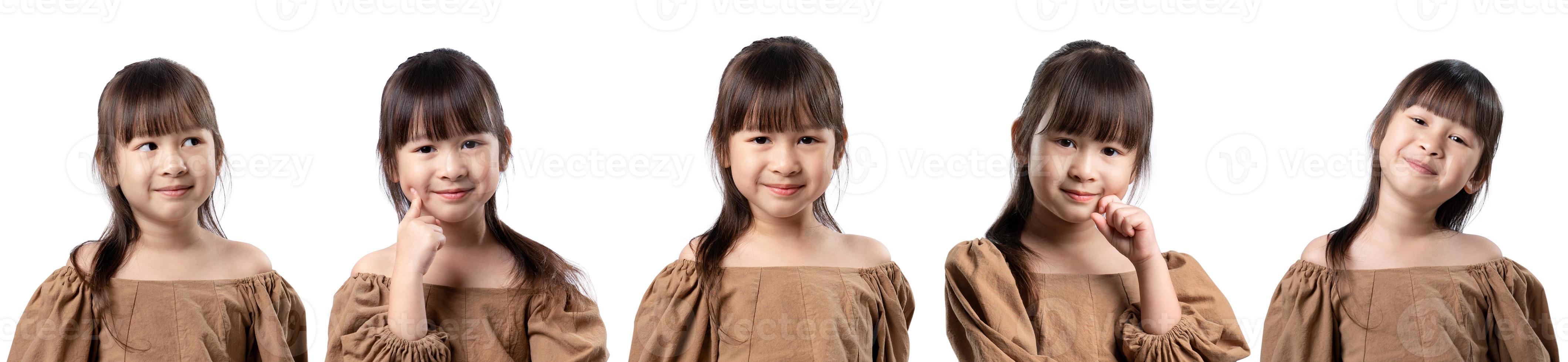 Set of surprised happy beauty asian little girl looking copy space in excitement. Expressive facial expressions. Presenting some product. isolated on white background. photo