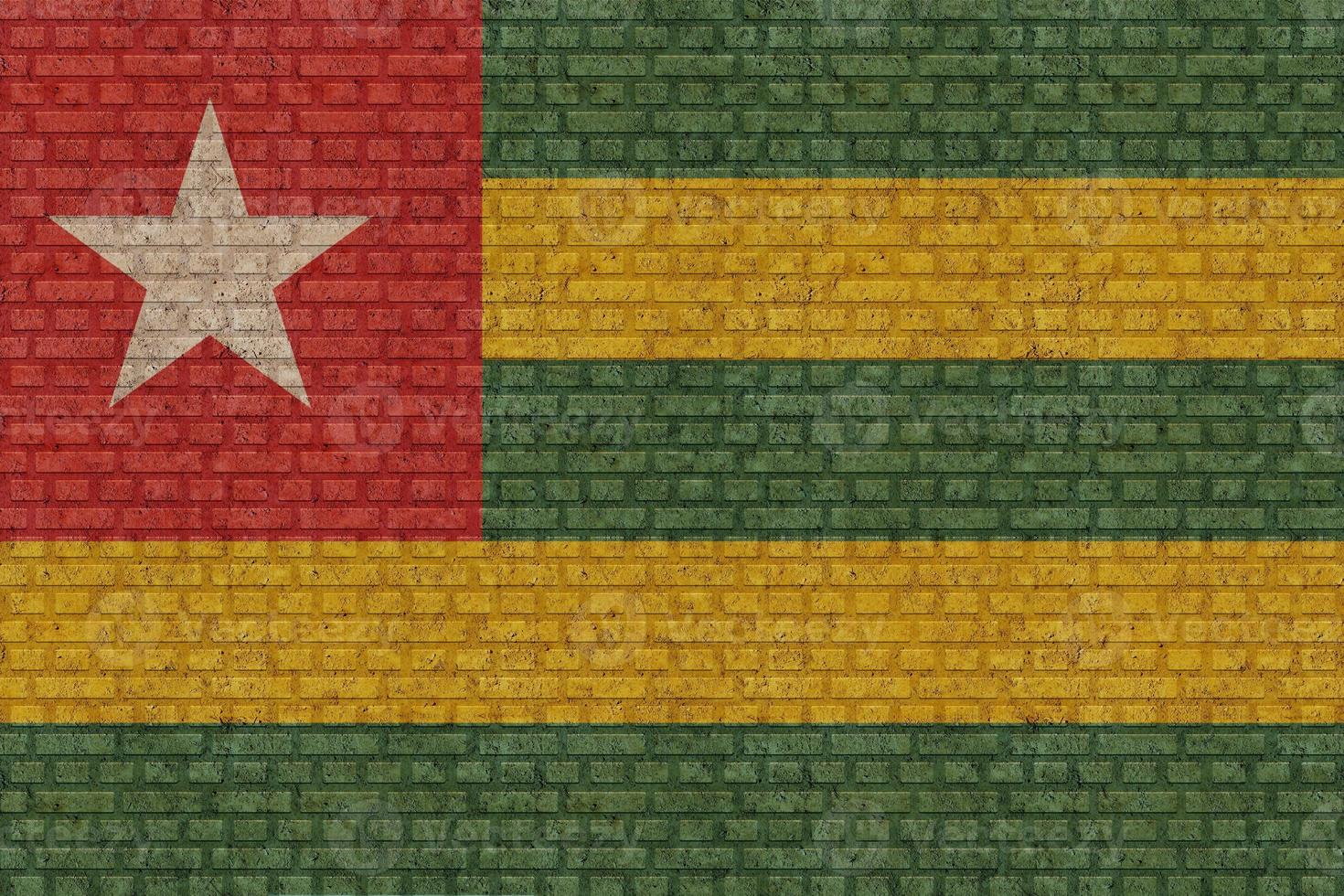 3D Flag of Togo on brick wall photo