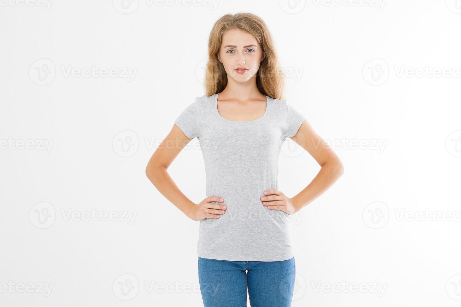 Young blonde woman with fit slim body in blank template t shirt and jeans isolated on white background. Skin and hair care. Copy space and mock up photo