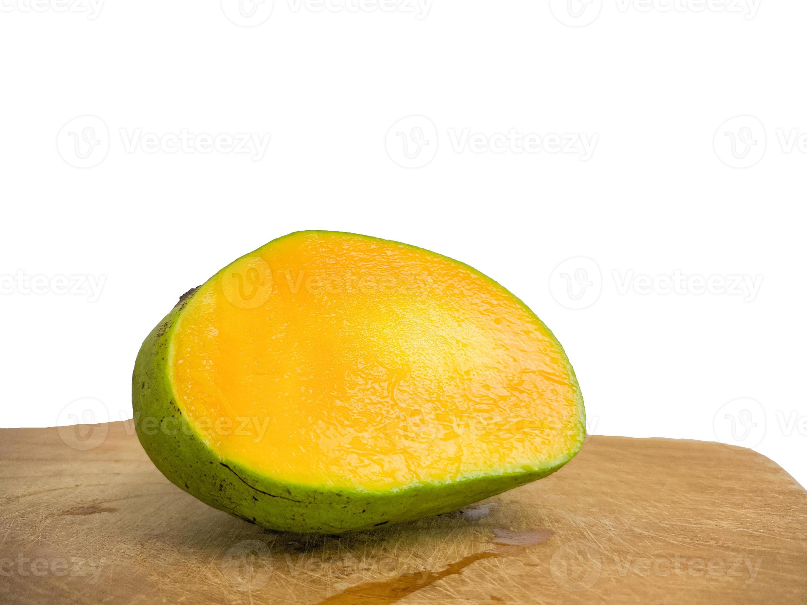 the mango is split on the wood. so that the inside is visible in orange