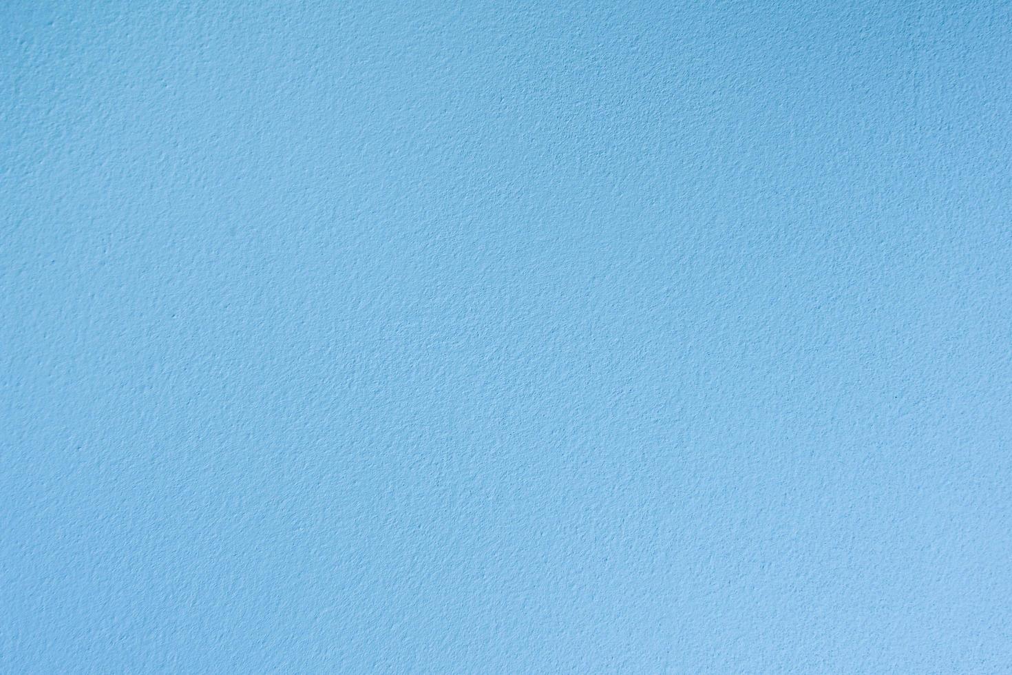 Blue pastel cement wall for background and texture and copy space photo