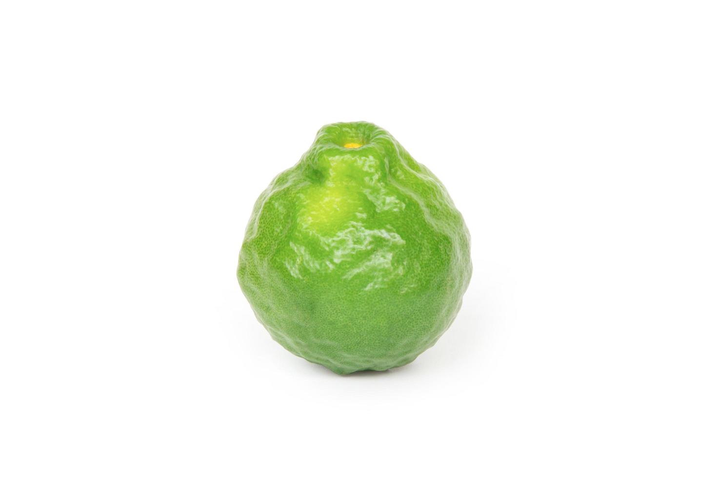 Bergamot with natural wrinkles on white background photo