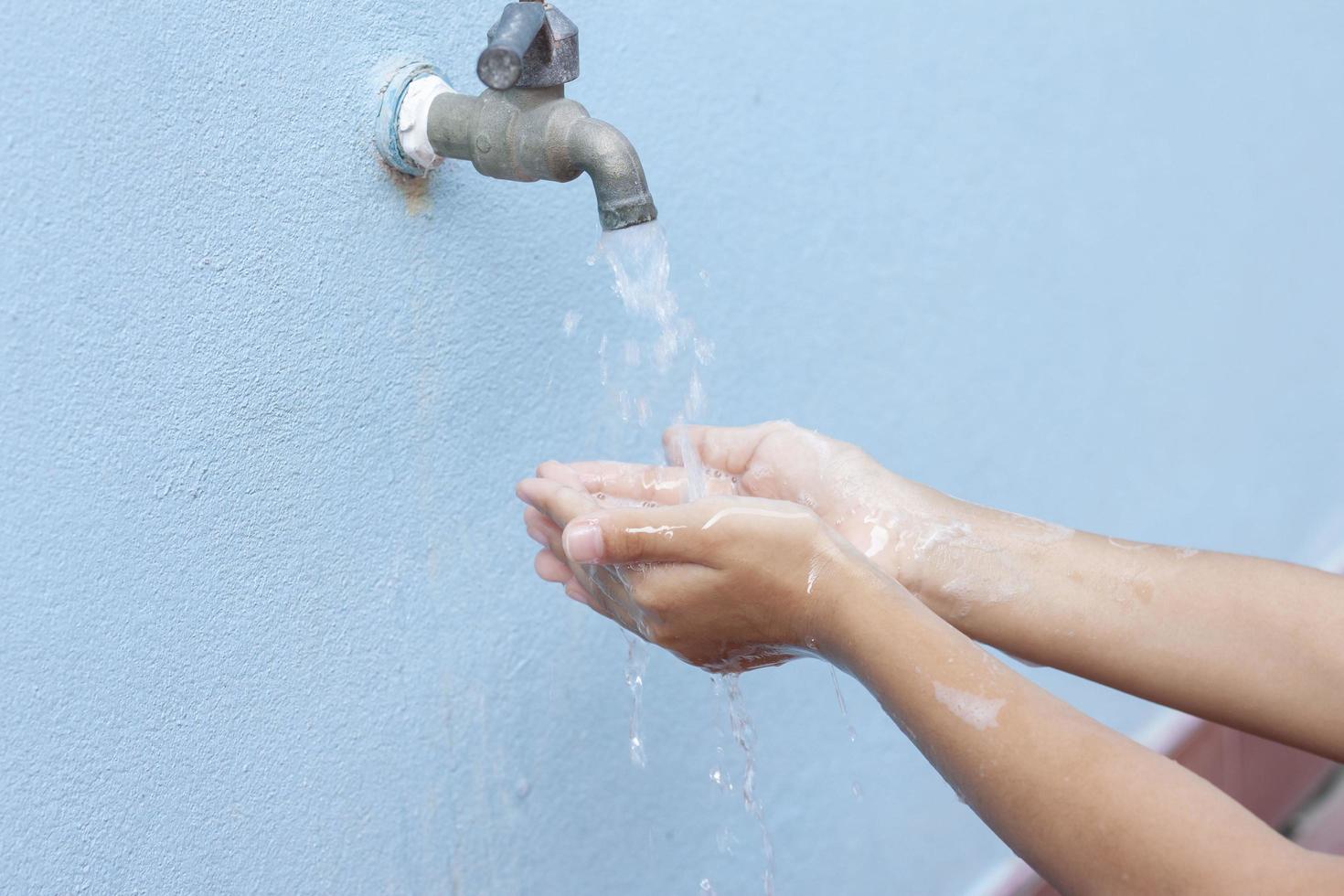 Wash their hands often with soap. To prevent the Novel Coronavirus disease starting in 2019 or Covid-19. photo