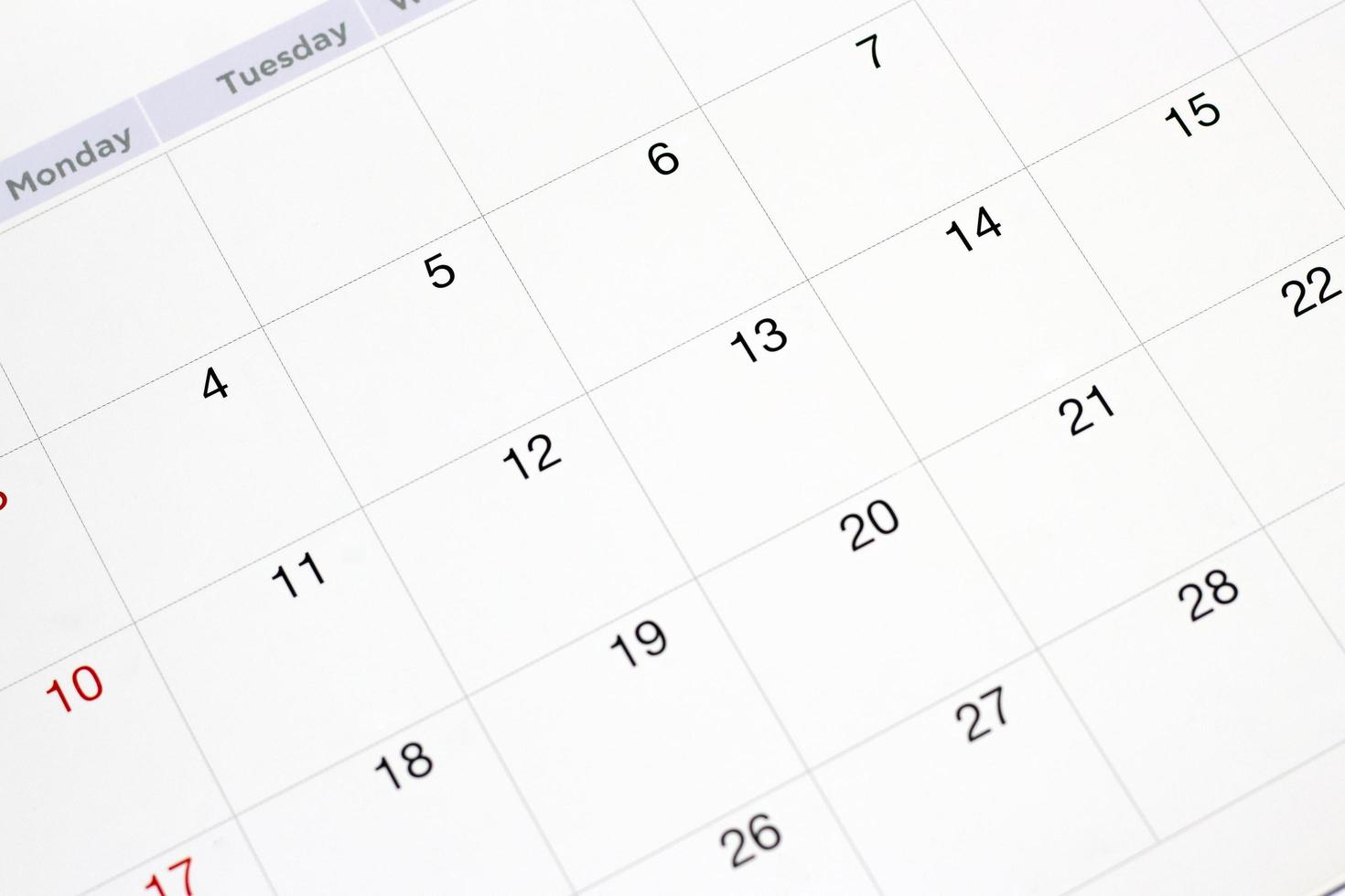 fechas en el fondo de la página del calendario, primer plano de los números en la página del calendario foto