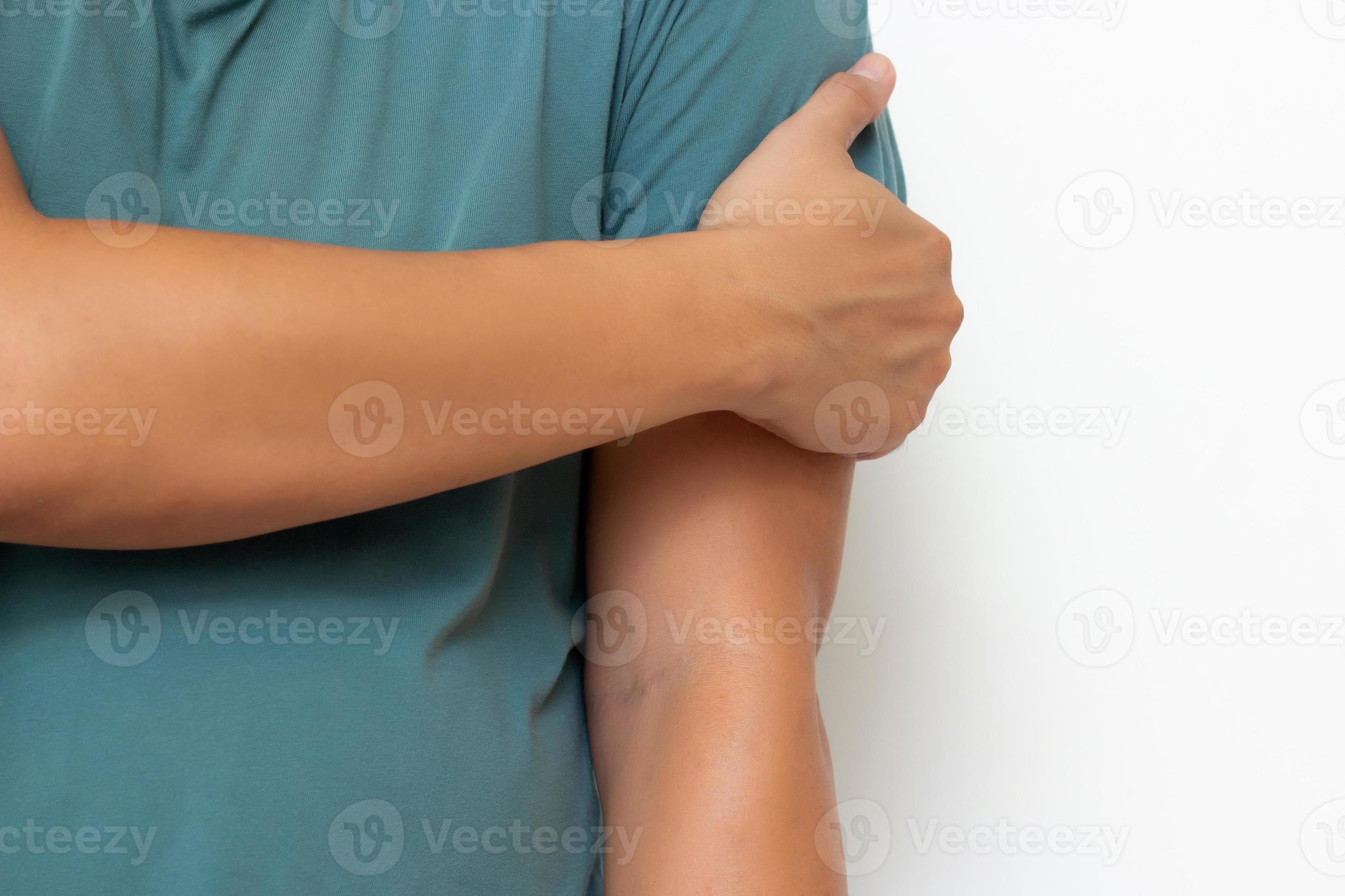Holding arm man with pain in muscles and joints,Symptoms of peripheral