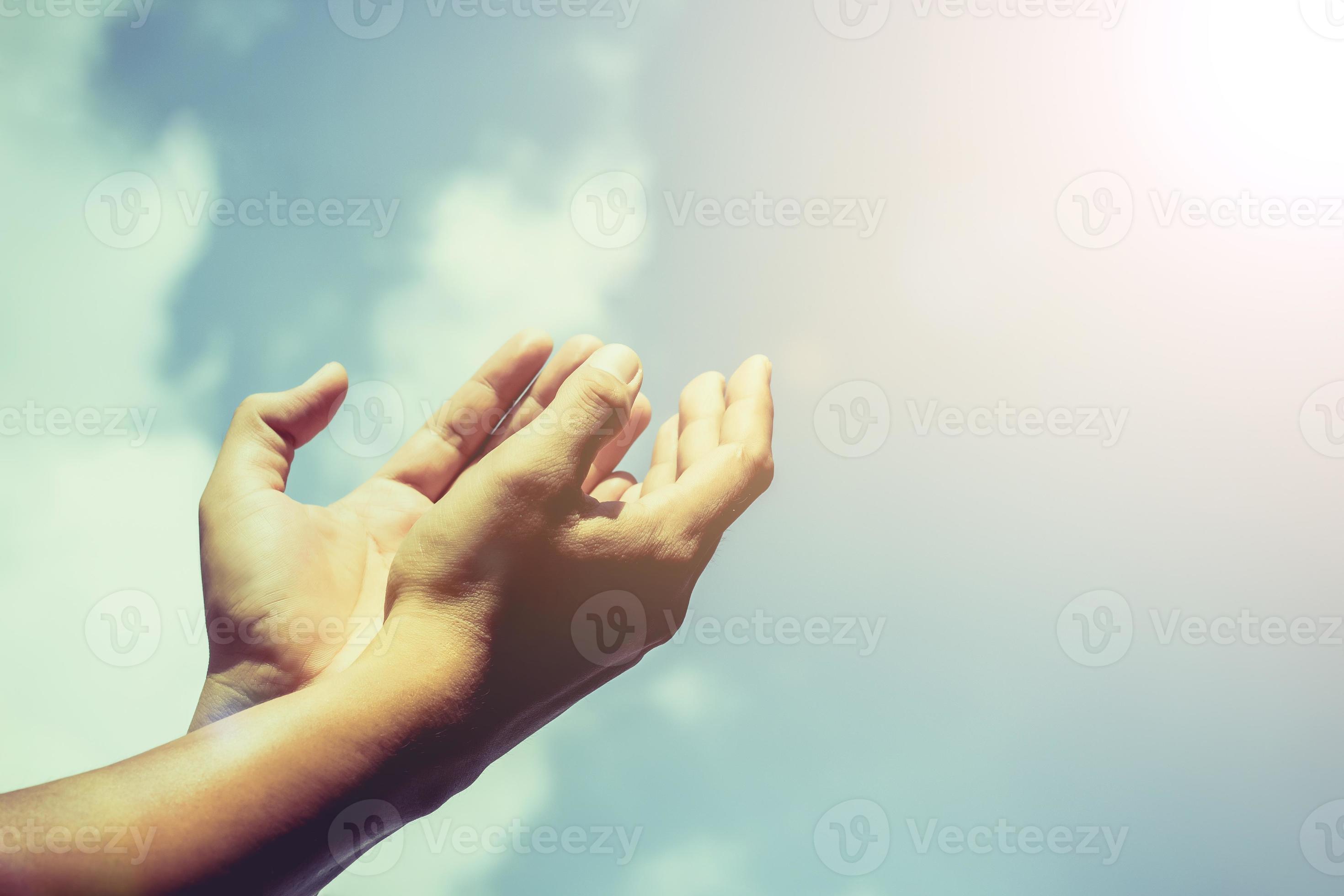 Hands of human are pray and worship on blue sky background with sunlight,  Soul of prayer man, Spirituality with believe and religion 13099027 Stock  Photo at Vecteezy