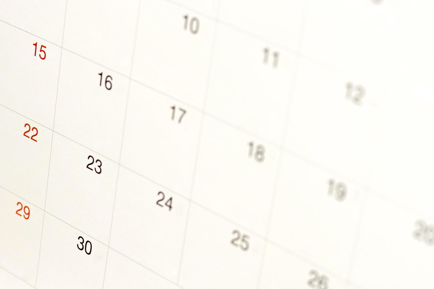 fechas en el fondo de la página del calendario, primer plano de los números en la página del calendario foto