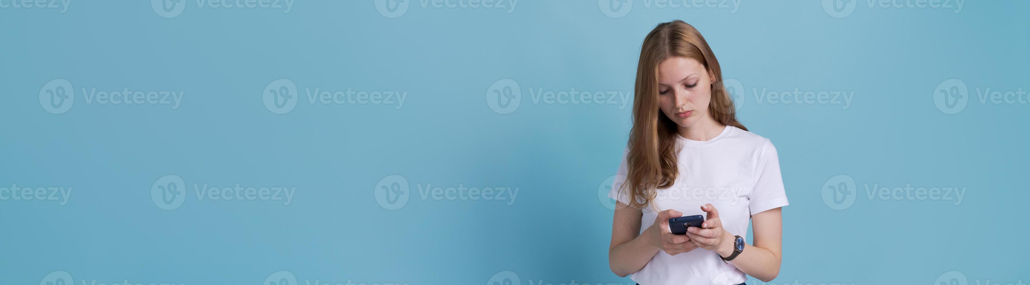 Important text message. European girl is worried about text message on her photo