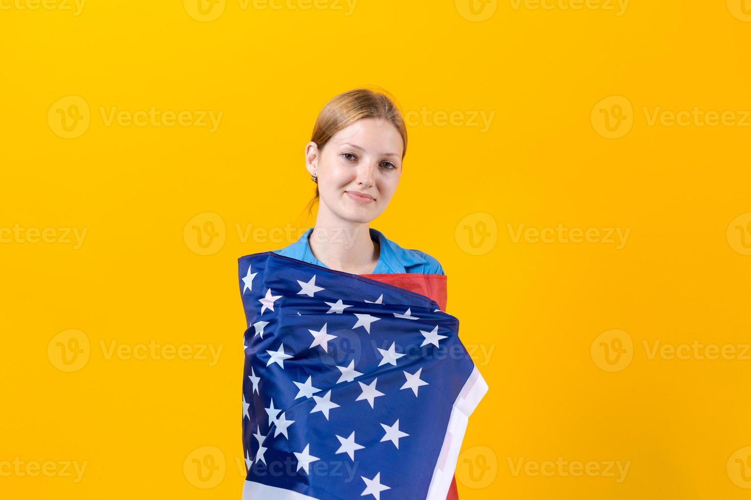 Celebration Independence Day. Stars and stripes. Young woman holding United photo