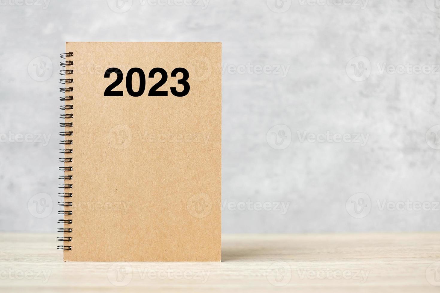 2023 Happy New Year calendar on table. countdown, Resolution, Goals, Plan,  Action and Mission Concept photo