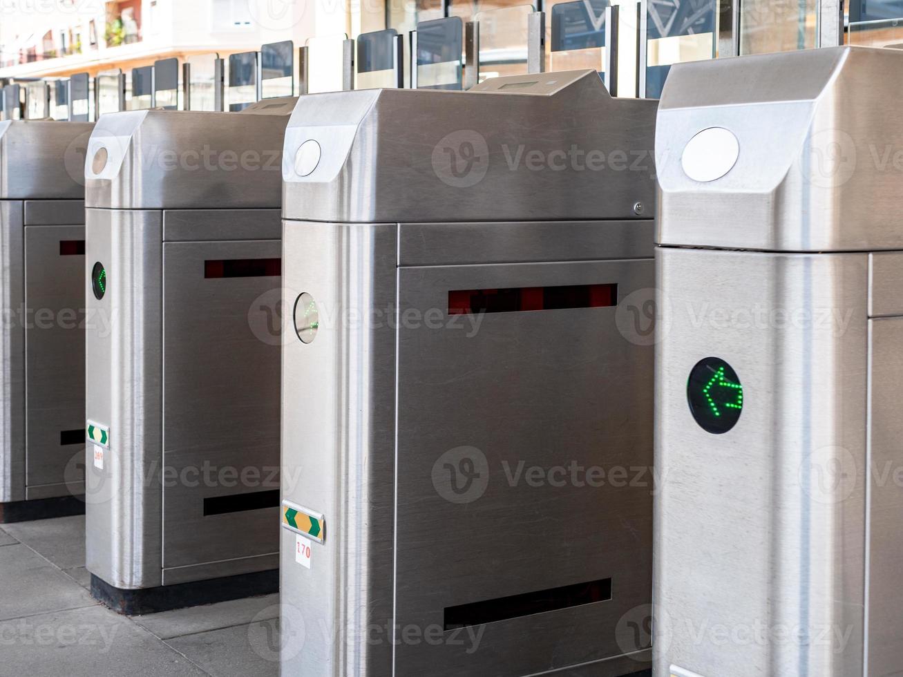 View of the station turnstiles waiting for crowds of passengers photo