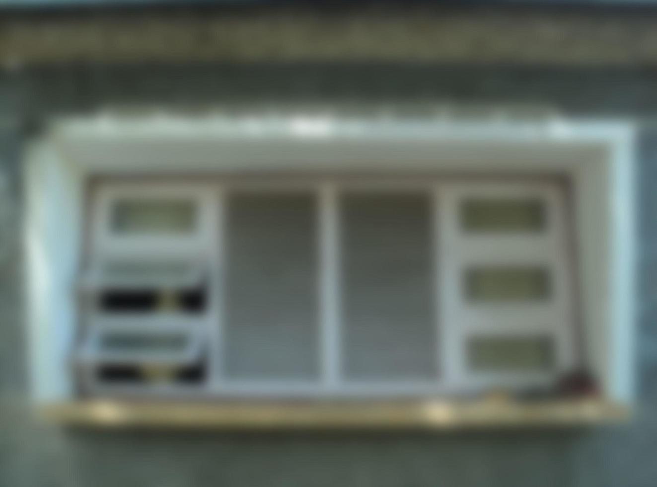 fondo abstracto desenfocado de una casa con arquitectura jengki. Arquitectura típica de Indonesia que simboliza la independencia de Indonesia. arquitectura antigua en el área de pragaan foto