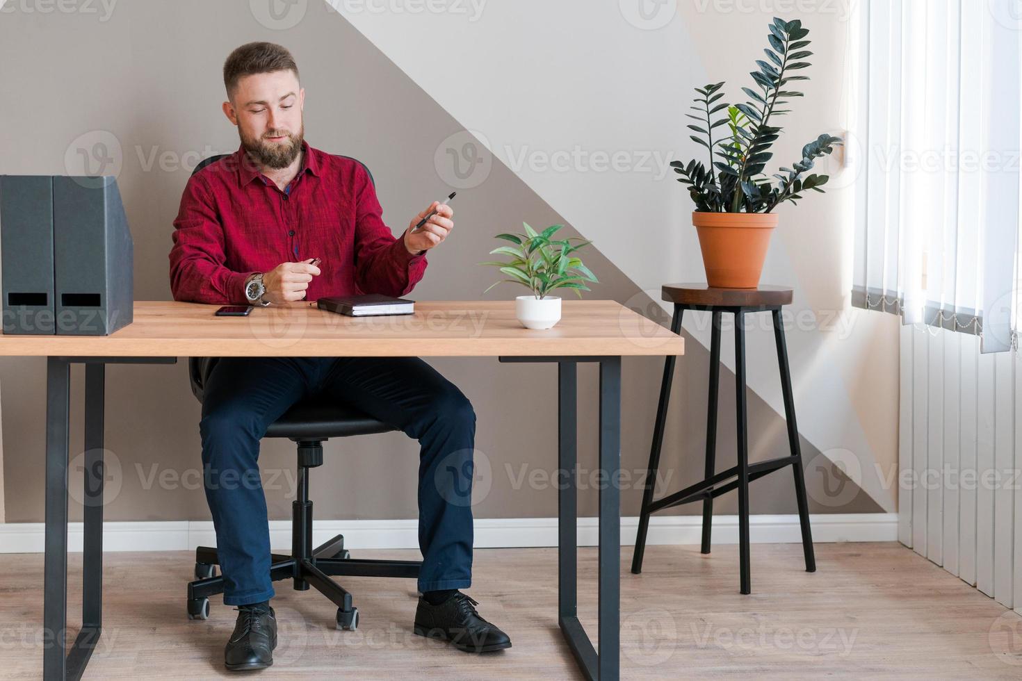 Businessman, executive director filling paper notepad, business planning photo