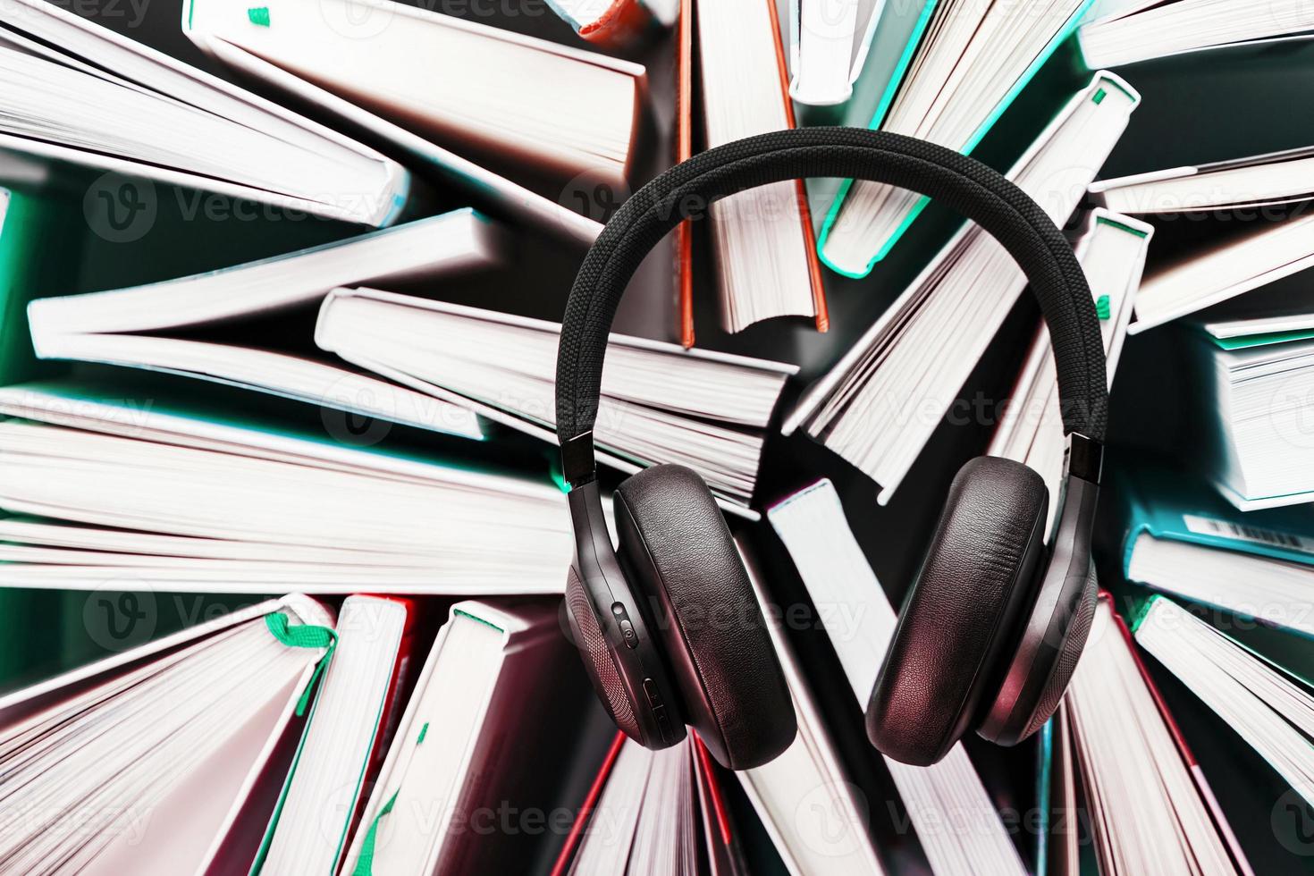 Audiobooks with wireless headphones and player concept photo