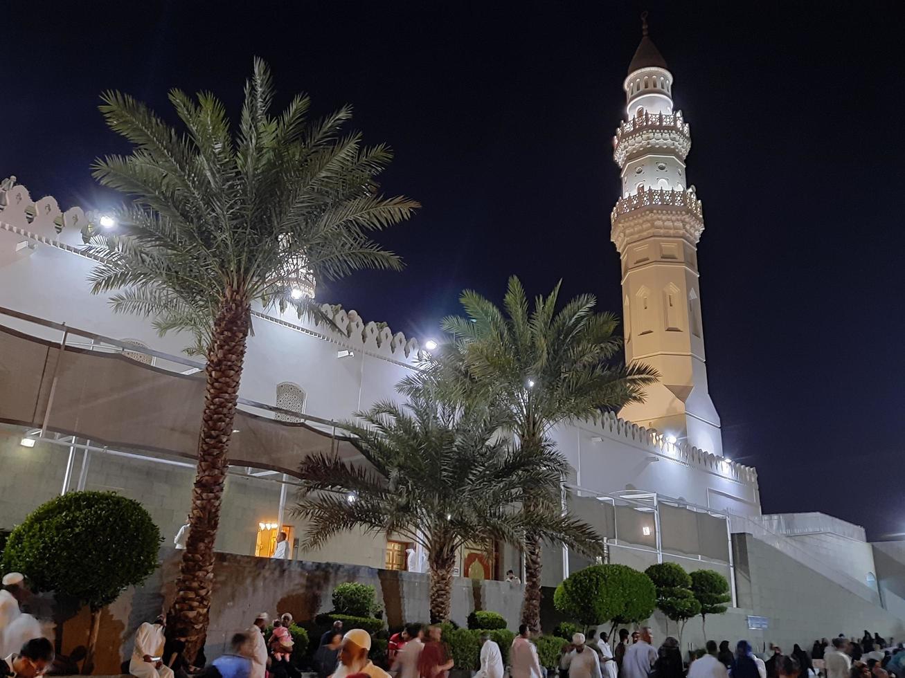 Medina, Saudi Arabia, Oct 2022 - A beautiful view of the minarets and dome of the Quba Mosque in Medina, Saudi Arabia at night. photo