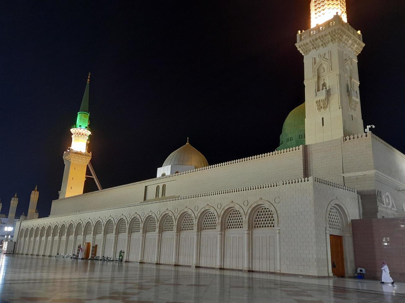 Medina, Saudi Arabia, Oct 2022 - Beautiful view of Masjid Al Nabawi Madinah in night lights. Masjid Al Nabawi Medina presents a very beautiful scene in the night lights. photo