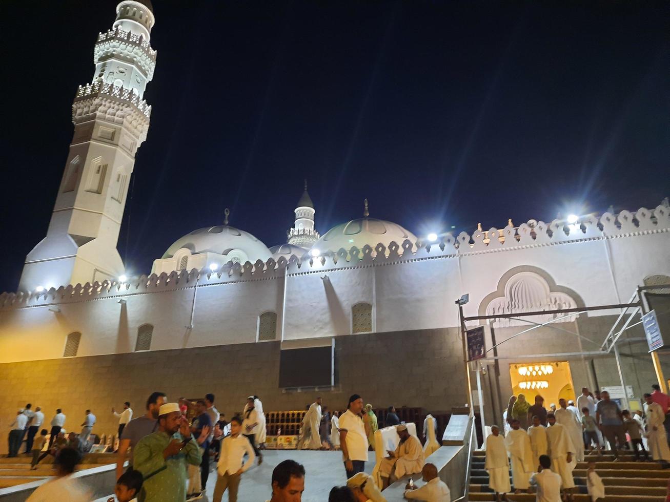 Medina, Saudi Arabia, Oct 2022 - A beautiful view of the minarets and dome of the Quba Mosque in Medina, Saudi Arabia at night. photo