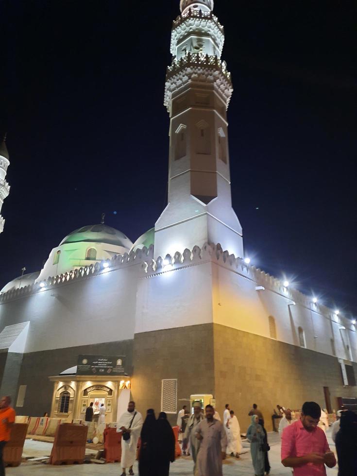 Medina, Saudi Arabia, Oct 2022 - A beautiful view of the minarets and dome of the Quba Mosque in Medina, Saudi Arabia at night. photo