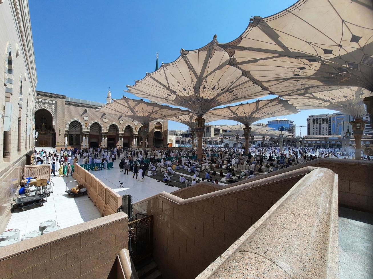 Medina, Saudi Arabia, Oct 2022 - A beautiful view of Prophet Mosque's outer courtyard and electronic umbrellas. photo