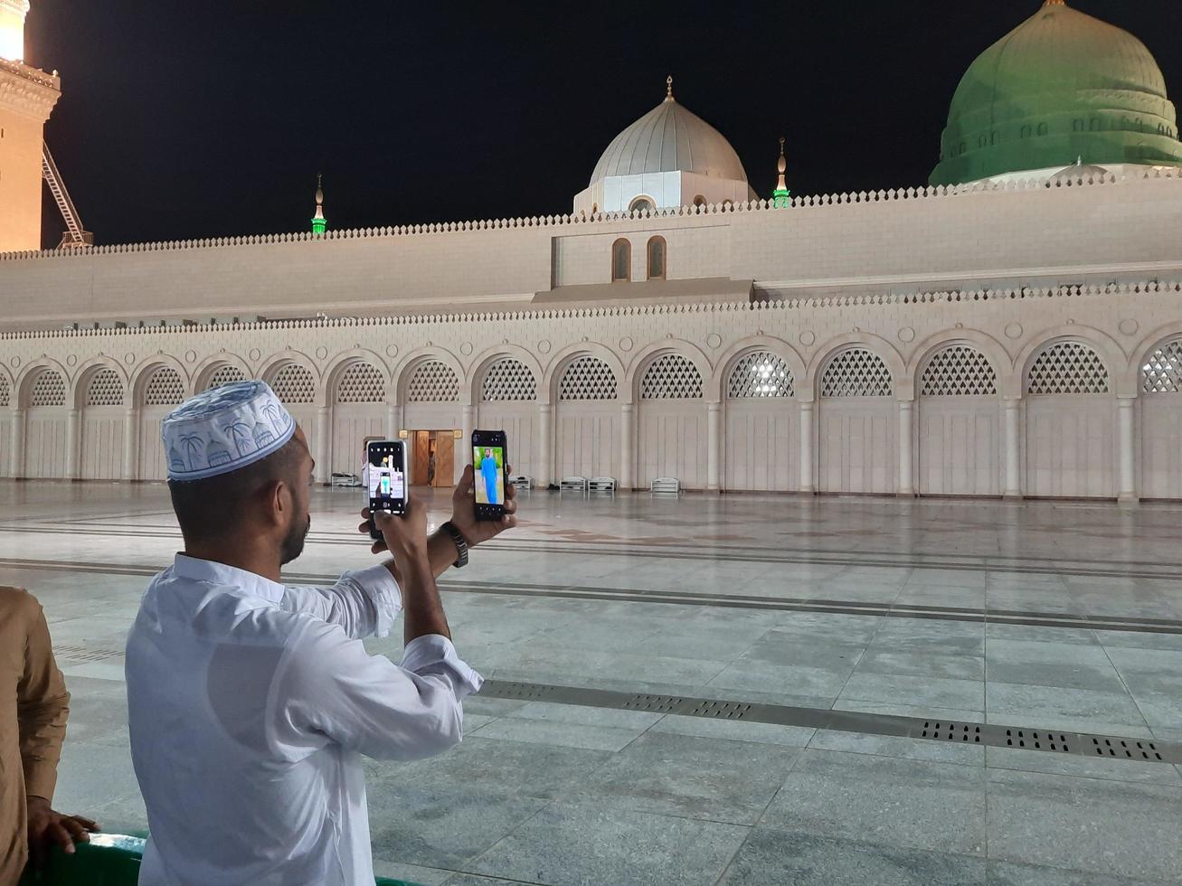 Medina, Saudi Arabia, Oct 2022 - Beautiful view of Masjid Al Nabawi Madinah in night lights. Masjid Al Nabawi Medina presents a very beautiful scene in the night lights. photo