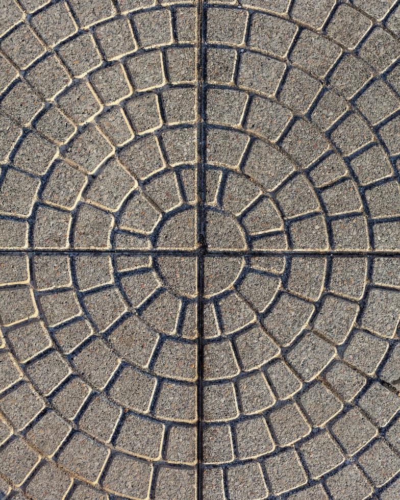 The floor tiles line the bricks in a beautiful circle. photo