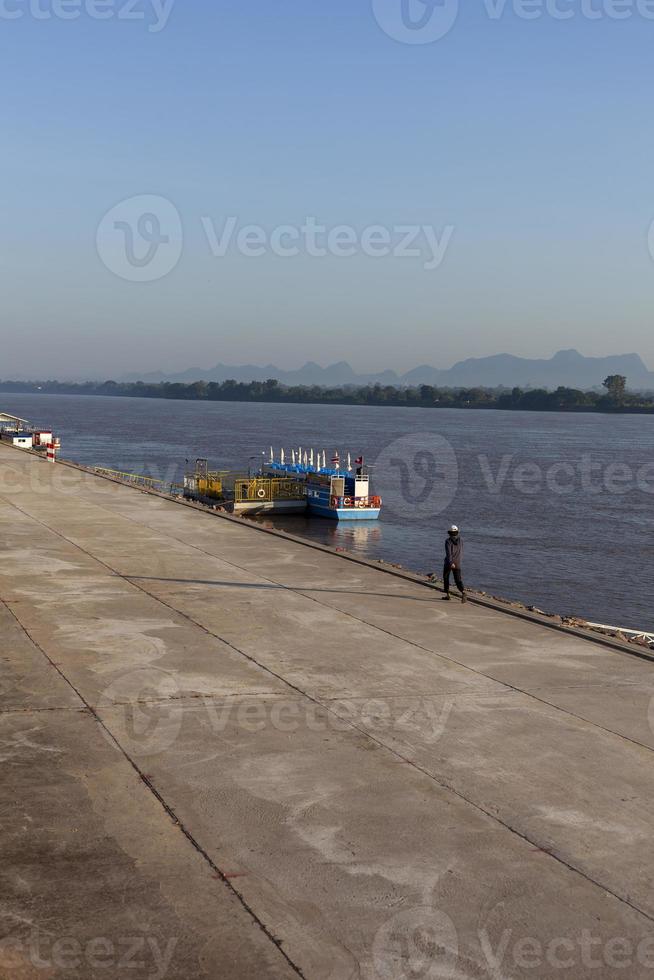 A transport port on the Mekong River in Nakhon Phanom province where people are exercising. photo