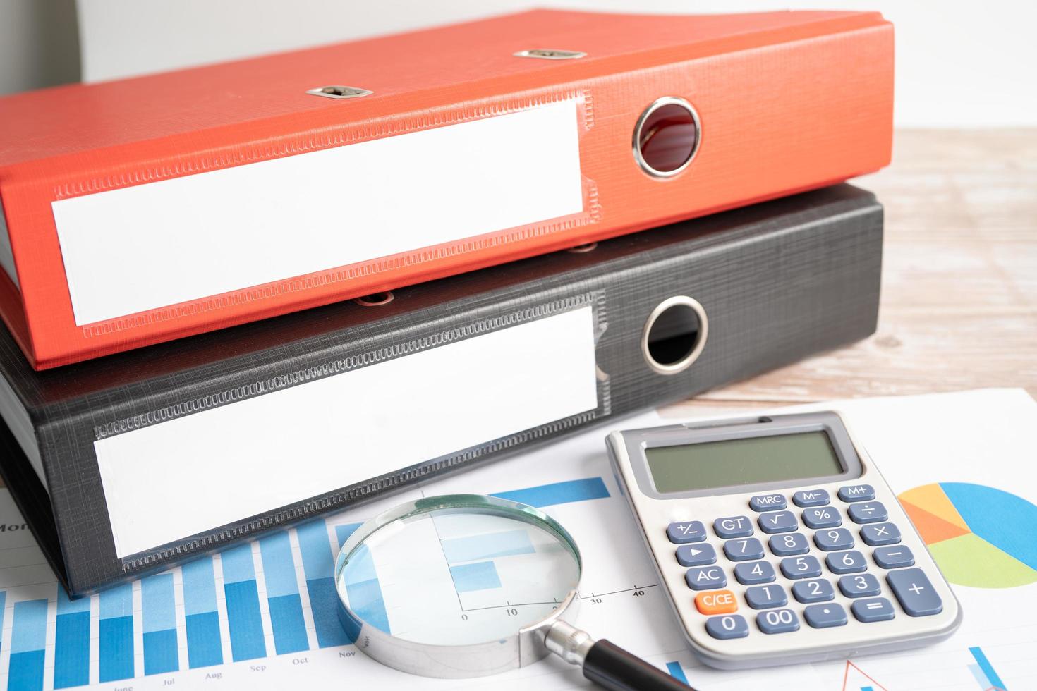 Binder data finance report business with graph analysis in office. photo