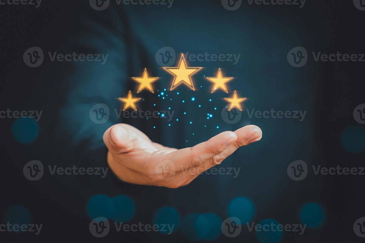 Man give positive reviews for customer satisfaction surveys, Five star rating, Customer assessment feedback, Service rating satisfaction concept. photo