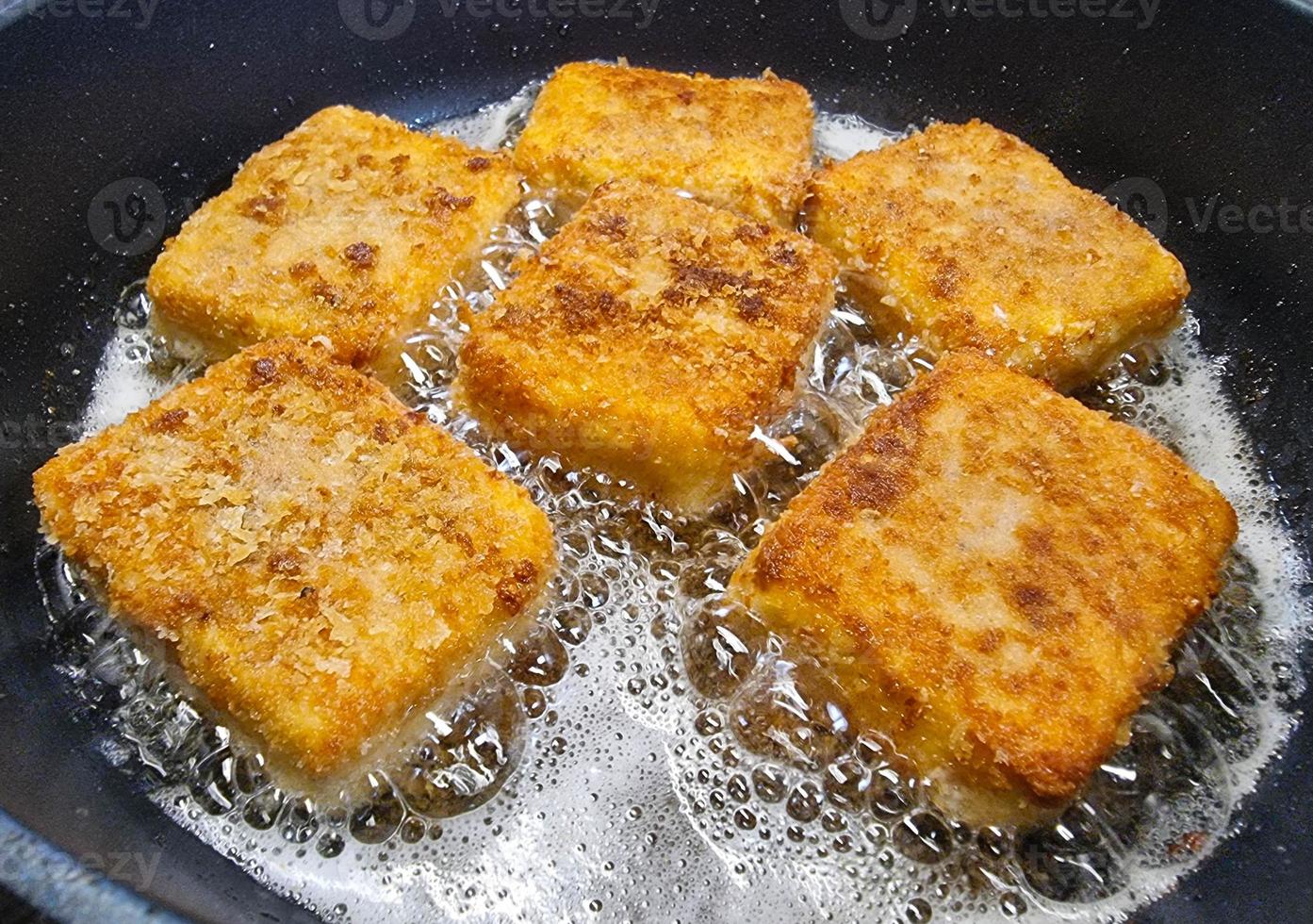 breaded and baked sheep's cheese photo