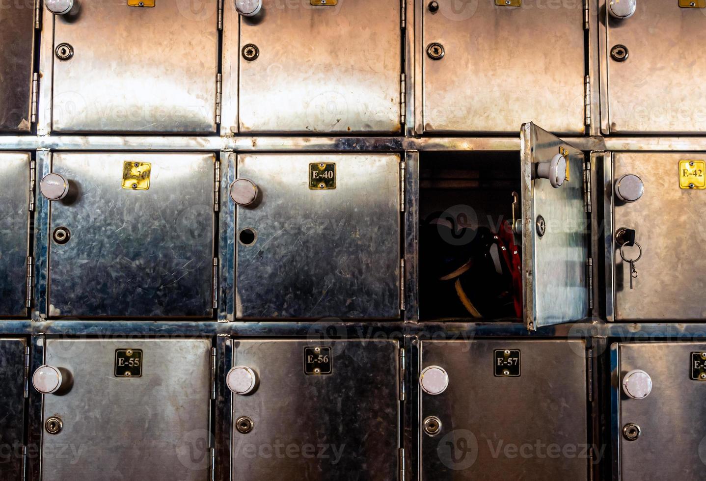 Full frame close-up of the old and scratched stainless lockable closet photo