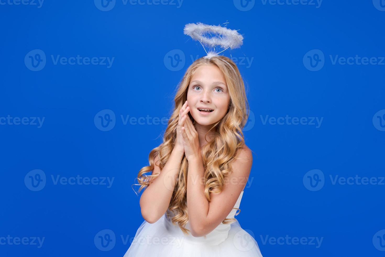 Angel girl with wings, valentine's day. Child with an angelic character. Little photo