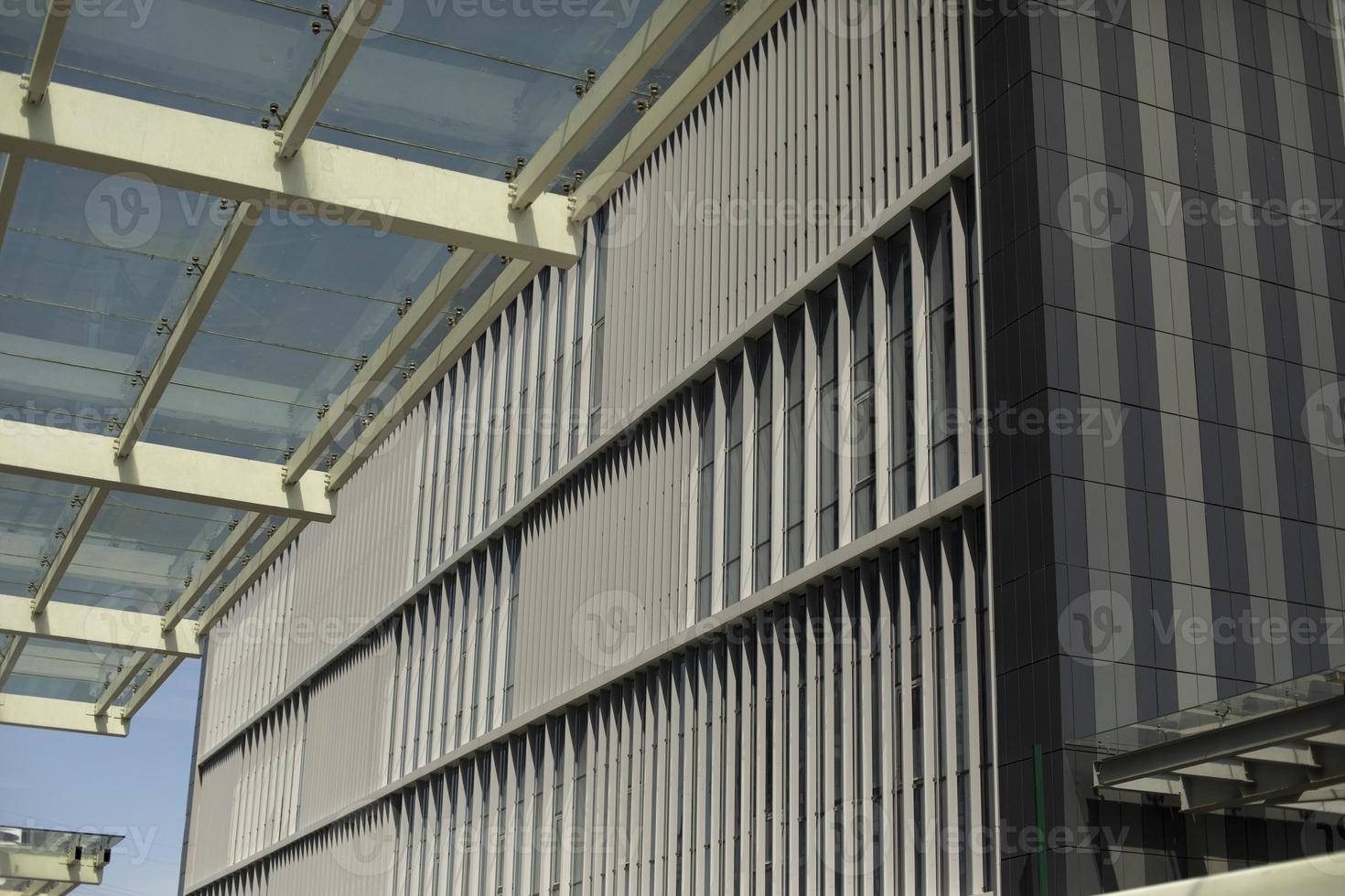 Building is outside. Windows in building. Vertical lines in architecture. photo