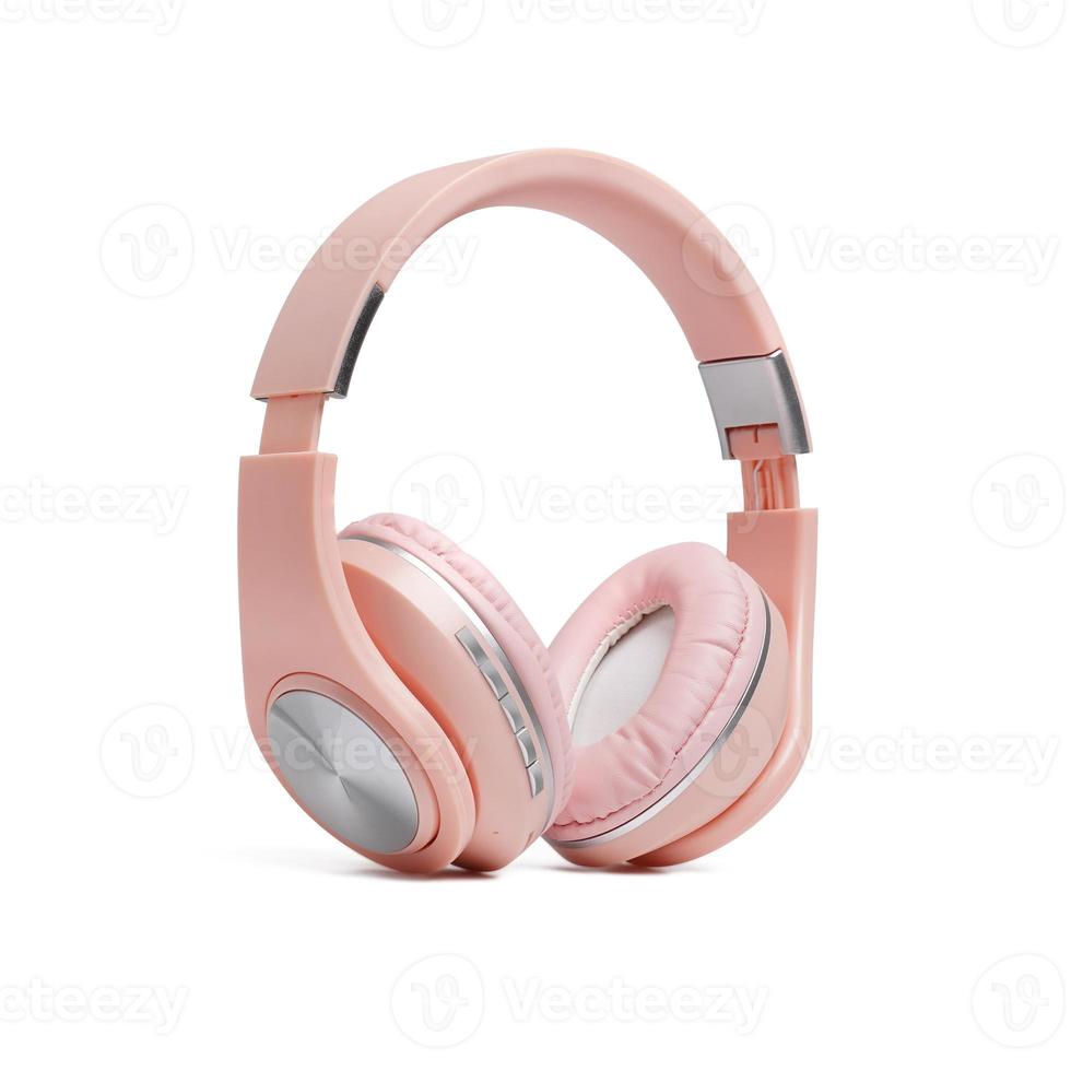 Modern pink wireless headphones isolated on white background with clipping path. photo