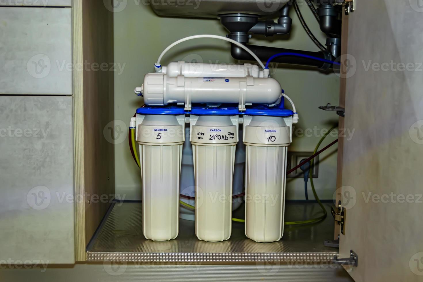 water filter system for home on background kitchen photo