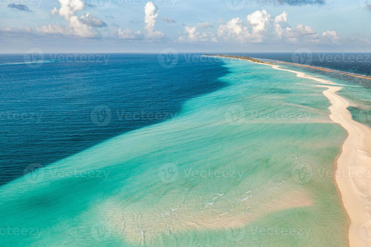 Relaxing aerial beach scene, summer vacation holiday template banner. Waves surf with amazing blue ocean lagoon, sea shore, coastline. Perfect aerial drone top view. Peaceful bright beach, seaside photo