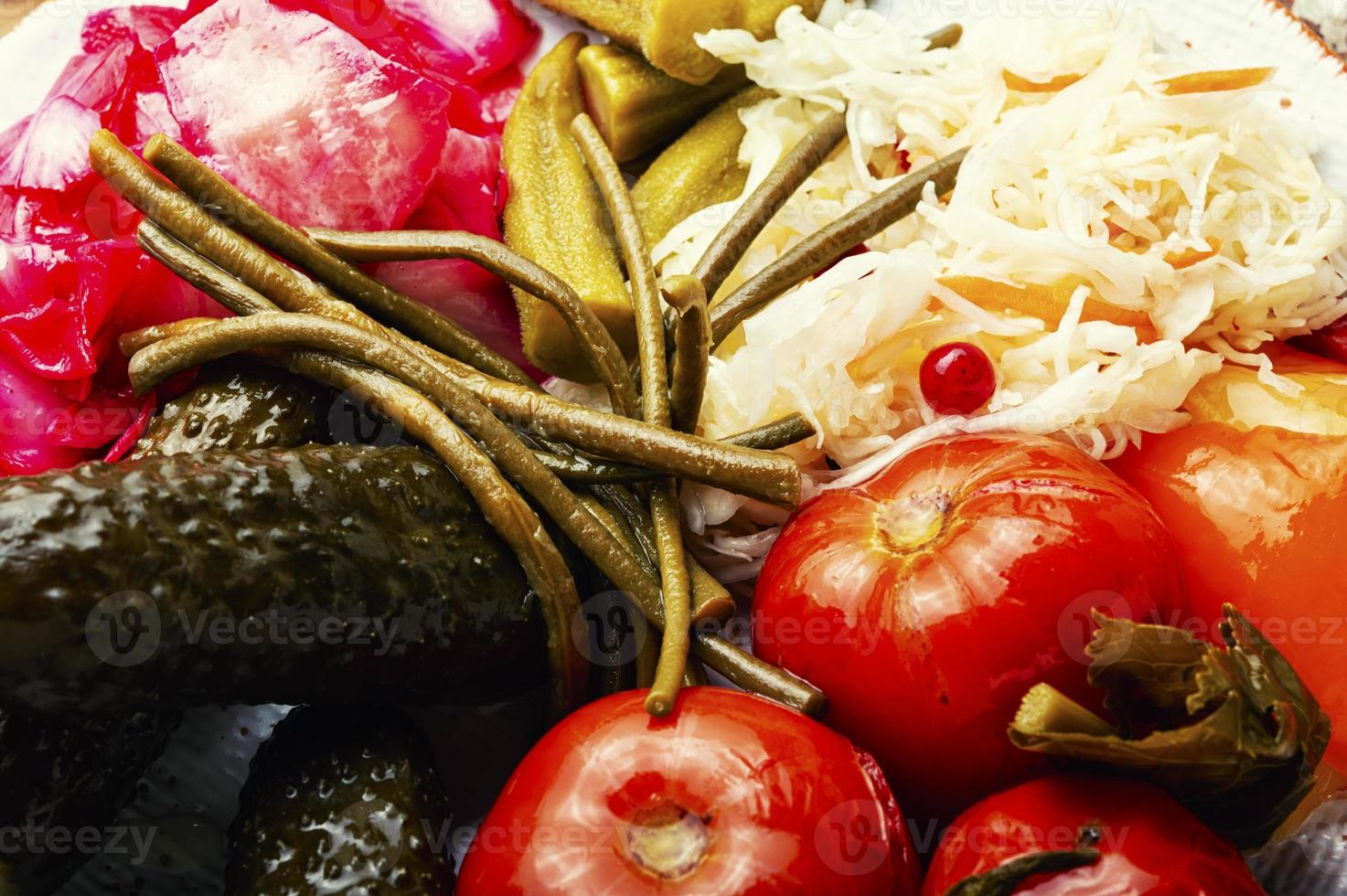 Pickled vegetables and sauerkraut, close up photo