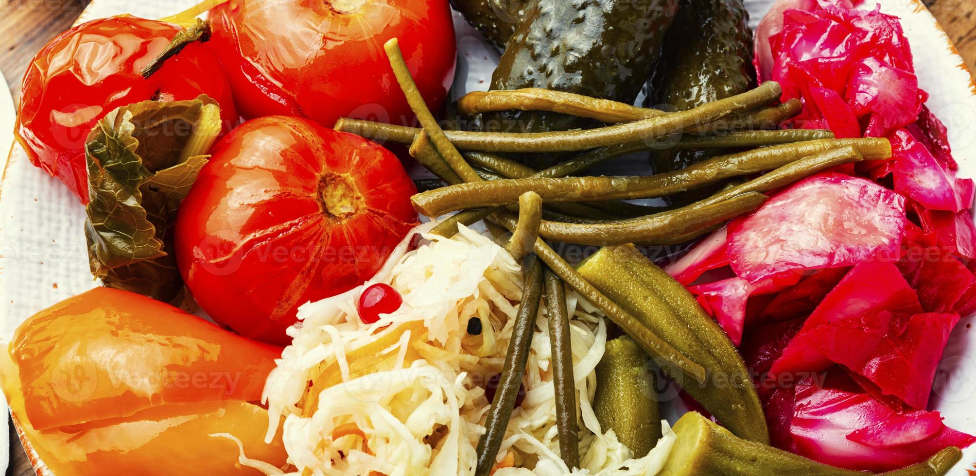 Pickled vegetables and sauerkraut. photo