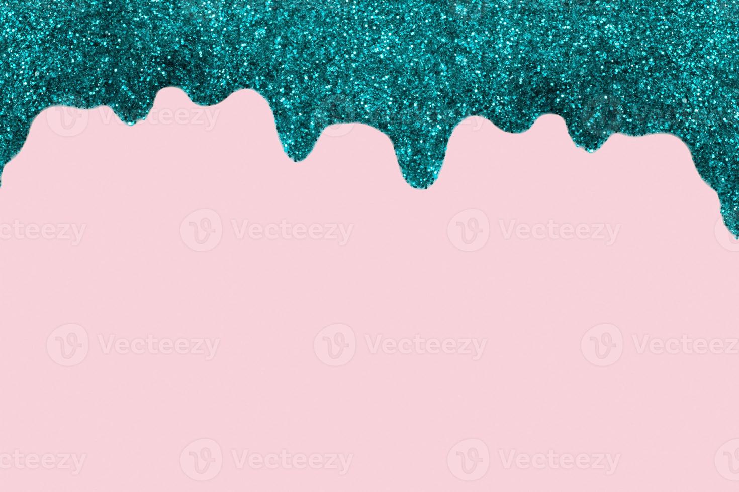 Shiny Turquoise border made of glitter gel on a pink background. Christmas background with copy space photo