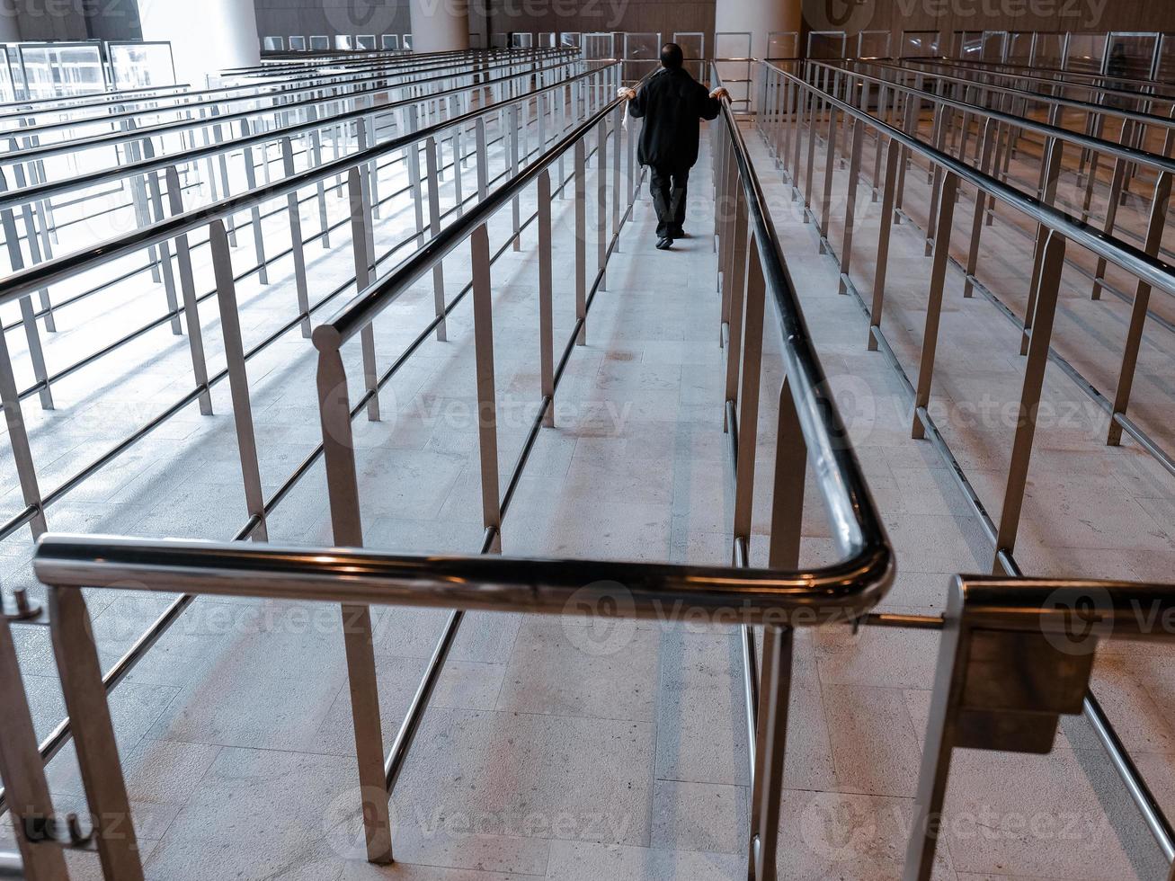 An empty queiue barriers photo