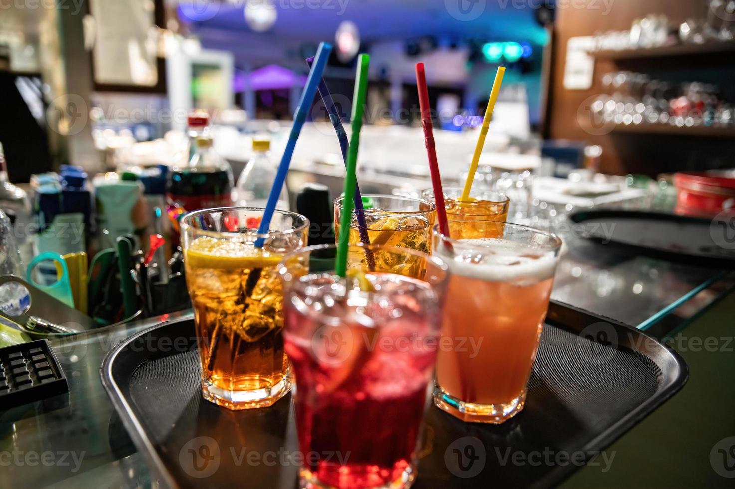 Composition of glasses with colored liqueurs photo