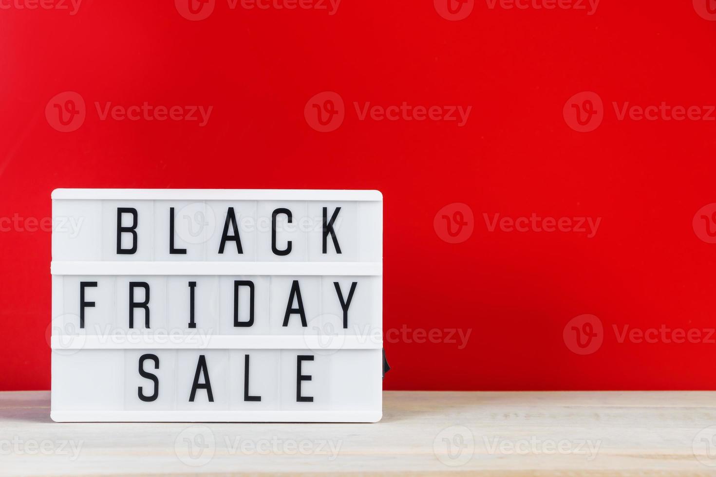 Black Friday concept. Sign on red background. photo